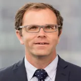 George W. Shuster, Jr.